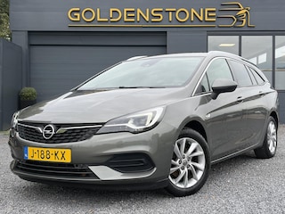 Opel Astra Sports Tourer 1.2 Elegance ✓131pk✓2e Eigenaar✓Camera✓Carplay✓6 Bak✓Stoelverw✓Stuurverw✓Pdc V+A✓Recent beurt gehad✓Clima✓Cruise✓Halfleder✓Keyless✓N.A.P✓Lm velgen✓Rijstrooksensor✓Apk tot 09-2028