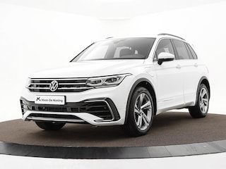 Volkswagen Tiguan 1.4 TSI eHybrid 245pk DSG R-Line Business · Camera · Inklap. Trekhaak · Dodehoeksensor · Parkeer Assistent · Stuur- & Stoelverwarming · 19"Velgen ·