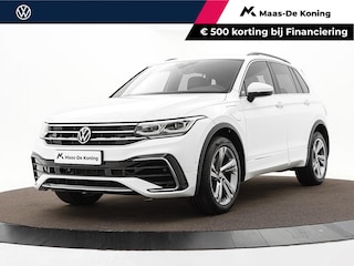 Volkswagen Tiguan 1.4 TSI eHybrid 245pk DSG R-Line Business · Camera · Inklap. Trekhaak · Dodehoeksensor · Parkeer Assistent · Stuur- & Stoelverwarming · 19"Velgen ·