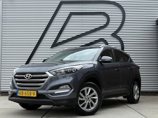 Hyundai Tucson 1.6 GDi Comfort 1e Eigenaar|Navi|Camera|Clima|Stoelverwarming|Cruise|Trekhaak|Leder|6-bak|Nieuwe APK bij Aflevering