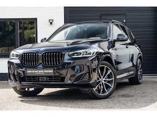BMW X3 XDrive30e M-sport Carbon Zwart Pano H&K HUD Trekhaak