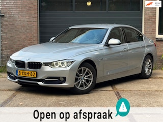 BMW 316i Sport Automaat | Keyless Entry | Navigatie | Stoelverwarming | Climate Control| Parkeerhulp V+A |