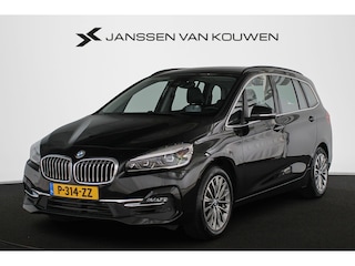 BMW 2-serie Tourer 216i Business Edition Plus Trekhaak Stoelverwarming Head-Up Harman Kardon