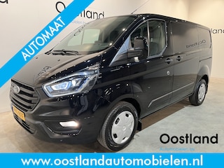 Ford Transit Custom 300 2.0 TDCI L1H1 Trend 130 PK Automaat / Euro 6 / Schuifdeur L + R / Airco / CarPlay / Cruise Control Adap. / Trekhaak / Xenon / Navigatie / 3-Zits / 27.300 KM !!