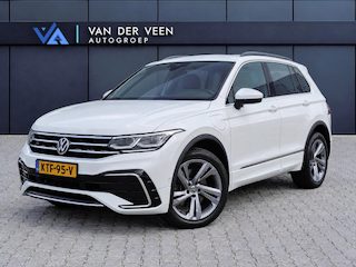 Volkswagen Tiguan 1.4 TSI eHybrid R-Line Business+ | Incl. 12 maanden garantie | SOH 92% | Stoel/stuurverwarming | Parkeercamera | Wegklapbare trekhaak | DAB radio | Apple carplay/Android auto | 100% dealer onderhouden |