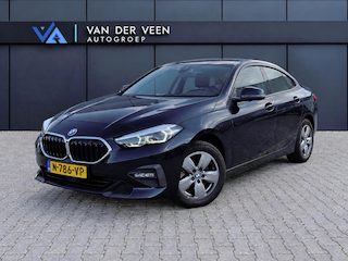 BMW 218i Business Edition | Incl. 12 maanden garantie | Cruise control | Climate control | Parkeersensoren | Apple carplay/Android auto | Navigatie | DAB radio | Vol leder sportstoelen |