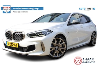 BMW M135i xDrive High Executive | Incl. 12 maanden Garantie | Akrapovič uitlaatsysteem | Dealer onderhouden | Stoelverwarming | Cruise controle | Apple CarPlay/Android Auto | Keyless start | Schakelflippers | Climate controle | Navigatie | Parkeersensoren V+A | Half lederen bekleding |