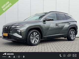 Hyundai Tucson 1.6 T-GDI HEV Comfort / 1e Eigenaar / NL Auto / Trekhaak 1650 KG / All Seasonbanden / Adaptive Cruise Control / Climate Control / Stoelverwarming / Achteruitrijcamera / Fabrieksgarantie t/m 01-2028 /