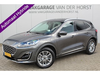 Ford Kuga 2.5-225pk PHEV Vignale. In uiterst nette staat verkerende Ford Kuga in de zeer chique Vignale uitvoering met slechts 23.000km ! Adapt. cruise cntrl, side- en lane assist, trekhaak, head-up display, B&O soundsyst., lederen int., stuur-, stoel-, achterbank- en voorraamverw. etc.