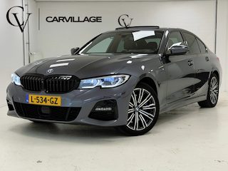 BMW 330e M-Sport | Schuif/kanteldak | Elektrische stoelen | Verwarmd stuur |