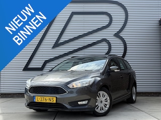 Ford Focus Wagon 1.0 Titanium 1e Eigenaar|Navi|Trekhaak|Carplay|Cruise|Airco|PDC|Stoelverwarming|APK tot 07-2027
