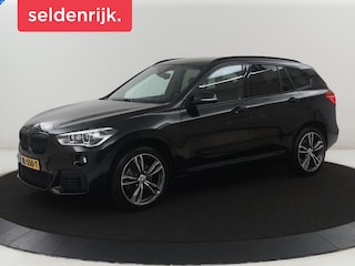 BMW X1 sDrive20i High Executive M-sport | Leder | Memory | Harman/Kardon | Head-up | Cruise control | Stoelverwarming | Climate control | Navigatie | Bluetooth | Park assist | Elektrische achterklep