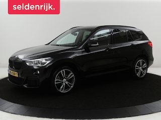 BMW X1 sDrive20i High Executive M-sport | Leder | Memory | Harman/Kardon | Head-up | Cruise control | Stoelverwarming | Climate control | Navigatie | Bluetooth | Park assist | Elektrische achterklep