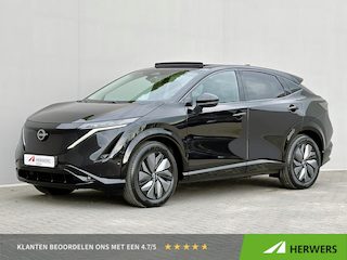 Nissan Ariya e-4ORCE Evolve 91 kWh 4WD / 306 PK / Leder / 1.500 kg Trekgewicht / Warmtepomp / 10 jaar Nissan More Garantie / Stoelverwarming voor en achter / Schuif-kantel dak / HUD / Stoelventilatie / Stuurverwarming / Rondomzicht camera / Elektrisch verstelbare stoelen met geheugen / Elektrische achterklep / Adaptieve cruise control / Apple Carplay/Android Auto /