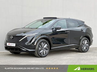 Nissan Ariya e-4ORCE Evolve 91 kWh 4WD / 306 PK / Leder / 1.500 kg Trekgewicht / Warmtepomp / 10 jaar Nissan More Garantie / Stoelverwarming voor en achter / Schuif-kantel dak / HUD / Stoelventilatie / Stuurverwarming / Rondomzicht camera / Elektrisch verstelbare stoelen met geheugen / Elektrische achterklep / Adaptieve cruise control / Apple Carplay/Android Auto /
