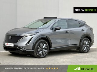 Nissan Ariya e-4ORCE Evolve 91 kWh 4WD / 306 PK / Leder / 1.500 kg Trekgewicht / Warmtepomp / 10 jaar Nissan More Garantie / Stoelverwarming voor en achter / Schuif-kantel dak / Stoelventilatie / Stuurverwarming / Rondomzicht camera / Elektrisch verstelbare stoelen met geheugen / Elektrische achterklep / Adaptieve cruise control / Apple Carplay/Android Auto /
