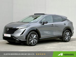 Nissan Ariya e-4ORCE Evolve 91 kWh 4WD / 306 PK / Leder / 1.500 kg Trekgewicht / Warmtepomp / 10 jaar Nissan More Garantie / Stoelverwarming voor en achter / Schuif-kantel dak / Stoelventilatie / Stuurverwarming / Rondomzicht camera / Elektrisch verstelbare stoelen met geheugen / Elektrische achterklep / Adaptieve cruise control / Apple Carplay/Android Auto /