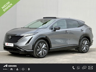 Nissan Ariya e-4ORCE Evolve 91 kWh 4WD / 306 PK / Leder / 1.500 kg Trekgewicht / Warmtepomp / 10 jaar Nissan More Garantie / Stoelverwarming voor en achter / Schuif-kantel dak / Stoelventilatie / Stuurverwarming / Rondomzicht camera / Elektrisch verstelbare stoelen met geheugen / Elektrische achterklep / Adaptieve cruise control / Apple Carplay/Android Auto /