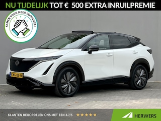 Nissan Ariya e-4ORCE Evolve 91 kWh 4WD / 306 PK / Leder / 1.500 kg Trekgewicht / Warmtepomp / 10 jaar Nissan More Garantie / Stoelverwarming voor en achter / Schuif-kantel dak / Stoelventilatie / Stuurverwarming / Rondomzicht camera / Elektrisch verstelbare stoelen met geheugen / Elektrische achterklep / Adaptieve cruise control / Apple Carplay/Android Auto /