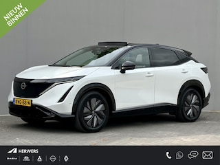 Nissan Ariya e-4ORCE Evolve 91 kWh 4WD / 306 PK / Leder / 1.500 kg Trekgewicht / Warmtepomp / 10 jaar Nissan More Garantie / Stoelverwarming voor en achter / Schuif-kantel dak / Stoelventilatie / Stuurverwarming / Rondomzicht camera / Elektrisch verstelbare stoelen met geheugen / Elektrische achterklep / Adaptieve cruise control / Apple Carplay/Android Auto /