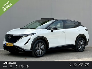 Nissan Ariya e-4ORCE Evolve 91 kWh 4WD / 306 PK / Leder / 1.500 kg Trekgewicht / Warmtepomp / 10 jaar Nissan More Garantie / Stoelverwarming voor en achter / Schuif-kantel dak / Stoelventilatie / Stuurverwarming / Rondomzicht camera / Elektrisch verstelbare stoelen met geheugen / Elektrische achterklep / Adaptieve cruise control / Apple Carplay/Android Auto /