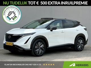 Nissan Ariya e-4ORCE Evolve 91 kWh 4WD / 306 PK / Leder / 1.500 kg Trekgewicht / Warmtepomp / 10 jaar Nissan More Garantie / Stoelverwarming voor en achter / Schuif-kantel dak / Stoelventilatie / Stuurverwarming / Rondomzicht camera / Elektrisch verstelbare stoelen met geheugen / Elektrische achterklep / Adaptieve cruise control / Apple Carplay/Android Auto /