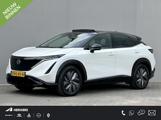 Nissan Ariya e-4ORCE Evolve 91 kWh 4WD / 306 PK / Leder / 1.500 kg Trekgewicht / Warmtepomp / 10 jaar Nissan More Garantie / Stoelverwarming voor en achter / Schuif-kantel dak / Stoelventilatie / Stuurverwarming / Rondomzicht camera / Elektrisch verstelbare stoelen met geheugen / Elektrische achterklep / Adaptieve cruise control / Apple Carplay/Android Auto /