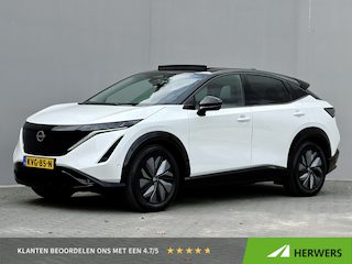 Nissan Ariya e-4ORCE Evolve 91 kWh 4WD / 306 PK / Leder / 1.500 kg Trekgewicht / Warmtepomp / 10 jaar Nissan More Garantie / Stoelverwarming voor en achter / Schuif-kantel dak / Stoelventilatie / Stuurverwarming / Rondomzicht camera / Elektrisch verstelbare stoelen met geheugen / Elektrische achterklep / Adaptieve cruise control / Apple Carplay/Android Auto /