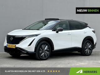 Nissan Ariya e-4ORCE Evolve 91 kWh 4WD / 306 PK / Leder / 1.500 kg Trekgewicht / Warmtepomp / 10 jaar Nissan More Garantie / Stoelverwarming voor en achter / Schuif-kantel dak / Stoelventilatie / Stuurverwarming / Rondomzicht camera / Elektrisch verstelbare stoelen met geheugen / Elektrische achterklep / Adaptieve cruise control / Apple Carplay/Android Auto /