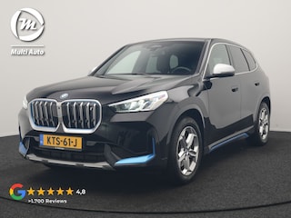 BMW iX1 xDrive30 X Line 67 kWh 313pk Dealer O.H. | Trekhaak Af Fabriek | Adaptive Cruise | Lederen Sportstoelen Massage & Verwarmd | Camera | Adaptief M-onderstel | Blis | Sfeerverlichting | Apple Carplay | Navigatie | DAB |