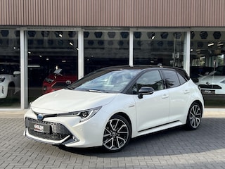 Toyota Corolla 1.8 Hybrid Executive | Parelmoer wit, 18 inch, Leer/Alcantara, Stoelverwarming, Parkeersensoren, Keyless, Apple CarPlay/Android auto