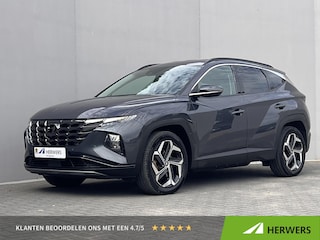 Hyundai Tucson 1.6 T-GDI PHEV Comfort Smart 4WD / 1.350 kg Afn. trekhaak / Dealer Onderhouden / Fabrieksgarantie tot 6-2029 / Accu SoH 89% / Elektrische klep / Stuur- en stoelverwarming / Navi / Apple Carplay Android / 19" LM wielen /