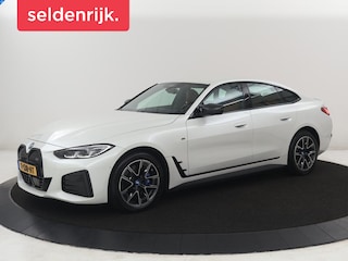 BMW i4 M50 High Executive 84 kWh | SOH 94.5% | Leder | Adaptive cruise | M-Sport stoelen | Head up | 360 camera | Memory | Stuur/stoel verwarming | M-sport stuur |