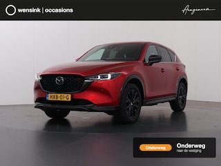 Mazda CX-5 2.0 SkyActiv-G HOMURA 165pk | Trekhaak | Navigatie | 360° Camera | Cruise Control Adaptief | Bose Audio | Winterpakket | Lederen Interieur |
