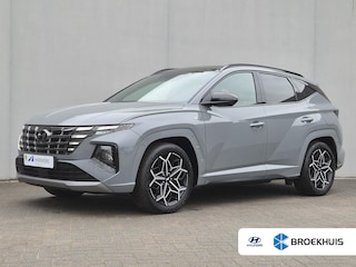 Hyundai Tucson 1.6 T-GDI HEV N Line Sky / Dealer onderhouden / Fabrieksgarantie tot 03-2027 / Trekhaak afneembaar / Panorama schuifdak / Trekgewicht 1650 kg / Navigatie / Apple Carplay Android / Elektrische achterklep / Stuur- Stoel & Achterbank verwarming / Rondomzicht camera /
