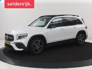 Mercedes-Benz GLB 200 Business Solution AMG | Panoramadak | Memory | Leder/alcantara | Trekhaak | Cruise control | Stoelverwarming | Camera | Park assist | Sfeerverlichting | Carplay