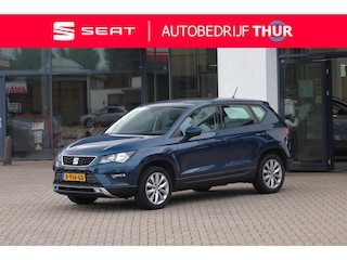 Seat Ateca 1.4 EcoTSI Style Door ons onderhouden stoelverwarming wegklapbare trekhaak navigatie parkeersensoren cruise control multifunctioneel lederen stuurwiel inklapbare spiegels 17" LMV met 4 seizoenen banden