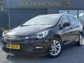Opel Astra Sports Tourer 1.4 Business Executive ✓2 Eigenaar✓Camera✓Navi✓Trekhaakt✓Carplay✓Stoelverw✓Stuurverw✓Automaat✓Dealer Onderhouden✓Keyless✓Clima✓Cruise✓Pdc V+A✓Halfleder✓Comfortstoelen✓150pk✓Rijstrooksensor✓Dodehoeksensor✓Elekt Stoelen✓Lm velgen✓N.A.P✓Apk tot 03-2027