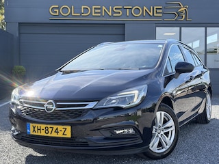 Opel Astra Sports Tourer 1.4 Turbo Online Edition ✓150pk✓2e Eigenaar✓Camera✓Carplay✓Navi✓Pdc V+A✓Stoelverw✓Stuurverw✓Clima✓Cruise✓Lm velgen✓6 Bak✓Comfortstoelen✓Dealer Onderhouden✓N.A.P✓Bj 12-2018✓Apk tot 01-2027