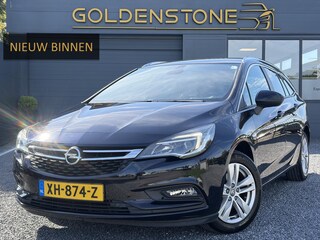 Opel Astra Sports Tourer 1.4 Turbo Online Edition ✓150pk✓2e Eigenaar✓Camera✓Carplay✓Navi✓Pdc V+A✓Stoelverw✓Stuurverw✓Clima✓Cruise✓Lm velgen✓6 Bak✓Comfortstoelen✓Dealer Onderhouden✓N.A.P✓Bj 12-2018✓Apk tot 01-2027