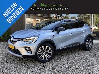 Renault Captur 1.6 E-Tech Hybrid 145 Initiale Paris | 1e Eigenaar | Adaptieve Cruise Control | Stoelverwarming | Stuurwielverwarming | Lederen Bekleding | Achteruitrijcamera | Apple Carplay/Android Auto |
