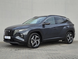 Hyundai Tucson 1.6 T-GDI PHEV Comfort Smart 4WD / SOH 97% / Dealer onderhouden / Fabrieksgarantie tot 06-2027 / 1.350 kg trekgewicht / Elektrische achterklep / Achteruitrijcamera / Stuur- & Stoelverwarming / Apple Carplay Android Auto / Adaptief cruise control /