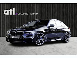 BMW M550i xDrive Executive M-Sport | Merino leder | 20" | Driving Assistent Plus | Comfort stoel met geheugen | Real-Time Traffic information | Zonnerolgordijnen achter | Stoelverwarming voor en achter | Etc.