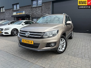 Volkswagen Tiguan 1.4 TSI Sport&Style | 1E EIGENAAR | 3/6/12MND GARANTIE | NAVI | PDC | 160 PK | LAGE KM |