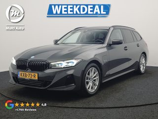 BMW 3-serie Touring 320e Facelift 204pk PHEV Dealer O.H. | Dravitgrau metallic | Head Up | Camera | Widescreen Navi | Stoelverwarming | Apple Carplay | Blis | Adaptive LED | Park Assist | DAB | Plug In Hybrid |