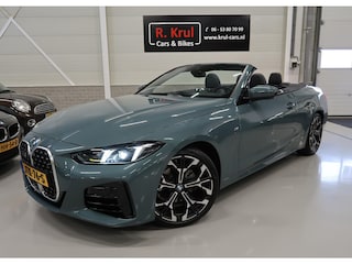 BMW 4-serie Cabrio 420i High Executive M-Sport Sportstoelen Camera Curved dash Navigatie Airco-ecc 19 inch Sportvelgen App connect Cape York Green metallic Zwart sportleer