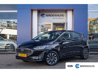 Ford Fiesta 1.0 EcoBoost Hybrid Titanium | Apple Carplay/Android Auto | Keyless | Stoel- Stuurverwarming | | Airco (automatisch) | Apple Carplay/Android Auto|telefoonintegratie premium | Keyless entry