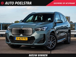 BMW iX1 eDrive20 67 kWh M Sport | SOH 100% | Trekhaak | Harman/Kardon | Keyless | LED | Camera | Navigatie | 18"