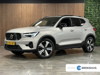 Volvo XC40 T5 Recharge Ultimate Dark | Trekhaak | Schuifdak | Harman Kardon | Parkeercamera | All Season banden | Adaptieve Cruise Control | Pilot Assist | BLIS Dode Hoek Detectie | Bestuurdersstoel elektrisch geheugen | Stoel en Stuurwielverwarming | Privacy Glass | 19 Inch | Passagiersstoel elektrisch | Microtech / alcantara bekleding met wit stiksel en bies | Zitting verlenging voorstoelen | Keyless Drive | Parkeersensoren voor+achter | Privacy Glass | Elektrisch bedienbare achterklep | Climate Control L+R | DAB Radio | Apple Carplay/Android Auto | Volvo On Call met mobiele App functie | Silver Dawn Metallic |