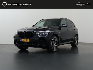 BMW X5 xDrive45e High Executive M Sport | SOH 91,3% | Elek. Trekhaak | Luchtvering | Panoramadak | Harman/Kardon | Cruise Control Adaptief | Lederen bekleding | Elek. Stoelen met Geheugen | Elek. Achterklep | Apple Carplay/Android Auto | Keyless Entry/Go |